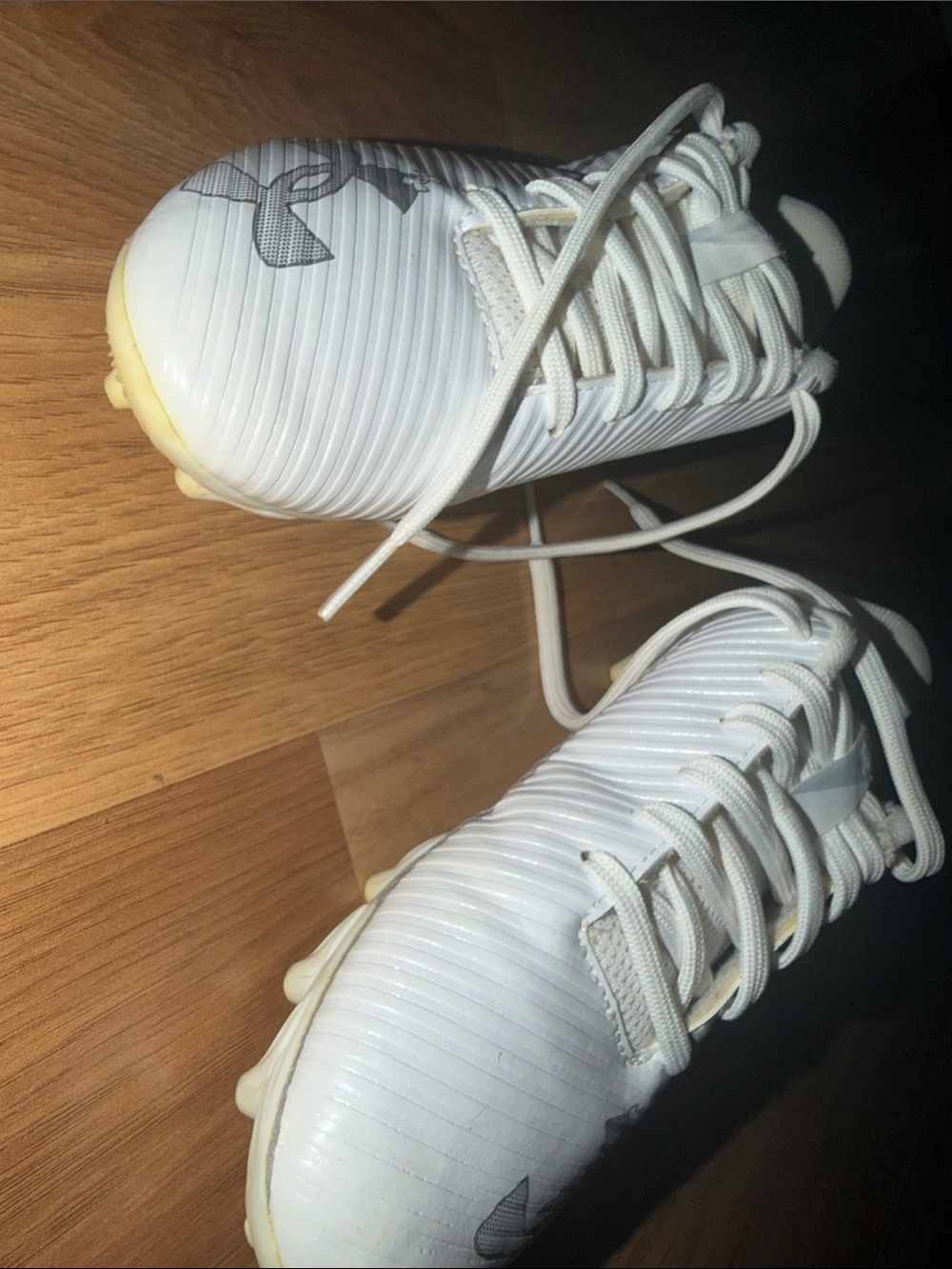 Under Armour Kids White Soccer Cleats with Silver Logo